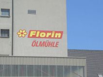 Muttenz: Hofackerstrasse, �lm�hle Florin,
                        Logo Nahaufnahme