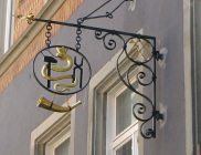 Zurich, Marktgasse (Market Alley), the
                        shield of the restaurant "Smithery
                        guild"