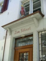 Zurich, "Trittligasse"
                        ("Stairs Alley"), house "zum
                        Sitkust" with a parrot sculpture over the
                        entrance door