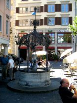 Zurich, Weinplatz (Wine Square),
                        Buttenm�nnchenbrunnen (Tub Man Fountain) at
                        Stork Hotel