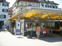 Zurich, Rathausbr�cke (Town Hall Bridge),
                        stand of Marinello with Sushi