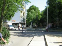 Zurich, "R�ntgenplatz"
                        ("Roentgen Square"), there is a little
                        Coop