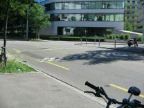 Zurich, "R�ntgenplatz"
                        ("Roentgen Square"), there is a
                        "Berlin Cushion" to calm down the car
                        traffic