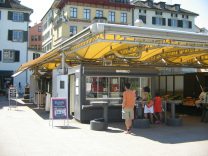 Zurich, Rathausbrcke (Town Hall Bridge),
                        stand of Marinello with Sushi