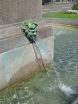 Alfred Escher Fountain, water coming out
                        from a boy's head