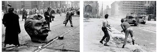 Ungarn-Aufstand 1956,
                russische Panzer in Budapest und der Marx-Kopf liegt auf
                der Strasse