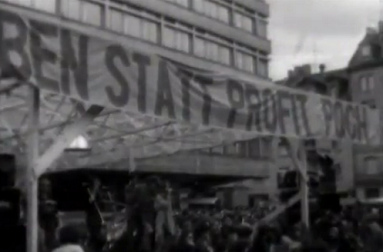Festivity of POCH at Helvetia Square
                          (Helvetiaplatz) on June 21, 1980 with the
                          slogan "Live instead of Profit"