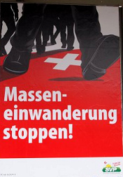 Racist poster of
                              SVP of 2011 with the general text
                              "stop mass immigration"
