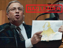 Mr. Nazi leader Blocher explaining his
                          version of Swiss history with a map of 1943,
                          March 18, 1997