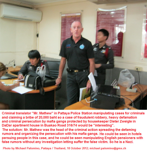 Krimineller �bersetzer in der
              Polizeistation von Pattaya an der Beach Road will 330
              Dollar Schmiergeld, damit er seine Hand bewegt