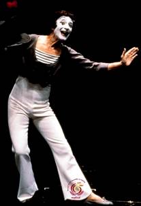 Marcel Marceau,
                        born in 1923, opening gesture
