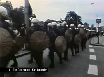Nazi mayor Sigmund
                          Widmer lets come hundreds of bully police
                          against this demonstration at Zurich town
                          hall, Zurich, June 18, 1980