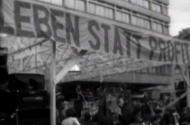 Festivity of POCH at Helvetia Square
                          (Helvetiaplatz) on June 21, 1980 with the
                          slogan "Live instead of Profit"