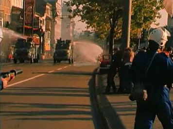 Limmat Quay
                            (Limmatquai) in Zurich, criminal bully
                            police is targeting two film makers,
                            distance about 5 meters, evening of Sep. 4,
                            1980