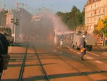 Tear gas water cannon
                          vehicle of criminal bully police of Zurich is
                          targeting people at the tram station of
                          Central Square, evening of Sep. 4, 1980