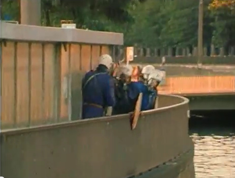 Zurich Station
                            Quay (Bahnhofquai), the criminal Zurich
                            violator bully policeman is strangling the
                            helpless woman, evening of Sep. 4, 1980