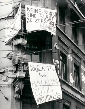 Squatting of Baden Street N� 2 with
                          banners "It's no artistic work destroying
                          a town. B�hrle", October 1983