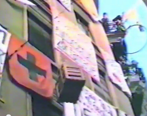 They were barricading
                          themselves in the house Baden Street N� 2 and
                          could get things into the house only by the
                          pulley. And there is a Swiss flag with a black
                          cross