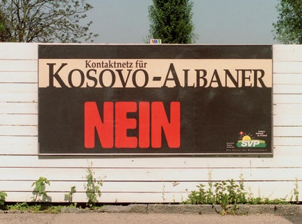 Poster of SVP in
                          1998 against a contact net for Kosovo
                          Albanians, mega poster of 4 posters [1]. Such
                          a poster can also be called terrorism...
                          graphic artist was probably the Nazi
                          Hans-Ruedi Ab�cherli...