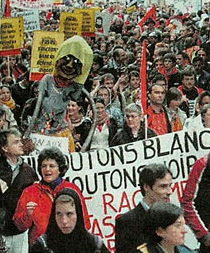 Demonstration in Lausanne
                        City against Nazi SVP in 2007 with a banner
                        against sheep (French: moutons)