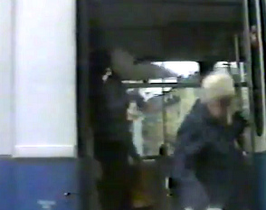 Squatter with a bird mask in a
                  Zurich tram in 1983 appr.